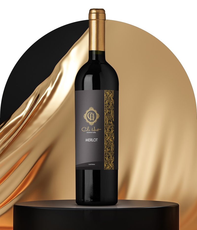 Bottle of Cole Hart Merlot wine in front of gold background